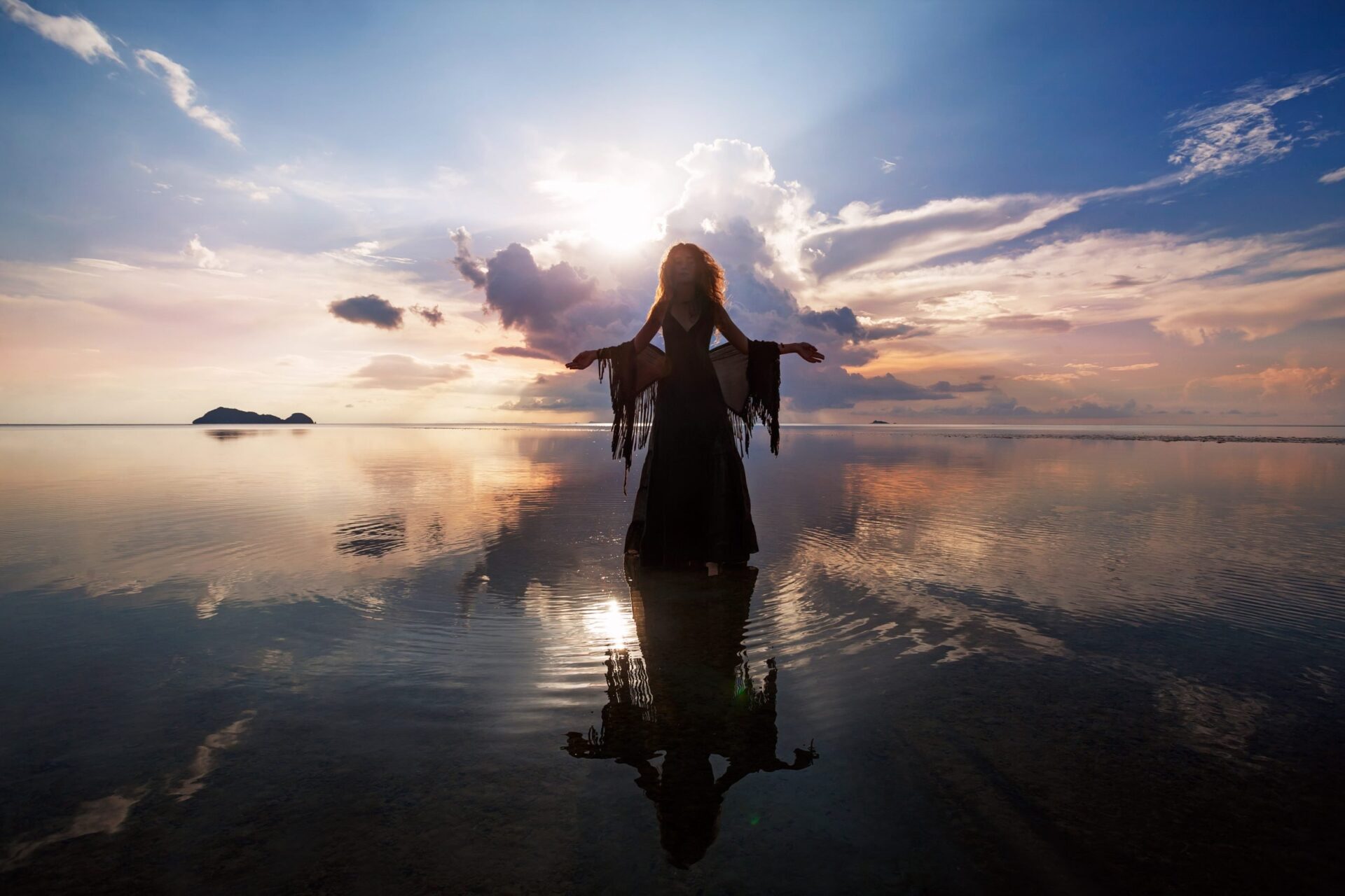 Photo of a goddess standing in water
