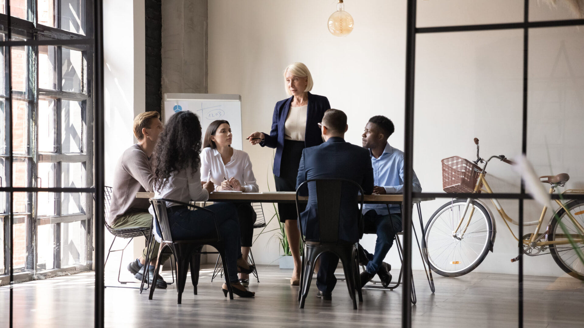 Photo of a group of people in a meeting at work