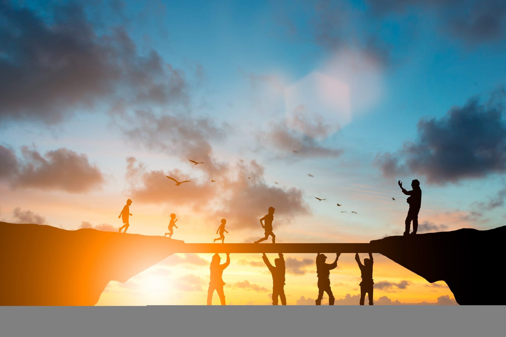 Photo of people working together to hold up a beam for some children to cross
