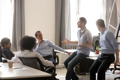 Team members talking and listening