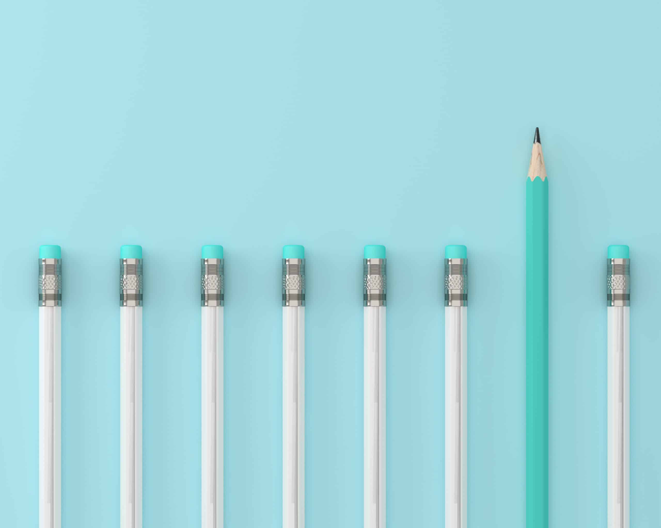 Photo of pencils in a line with one pushed out above the rest