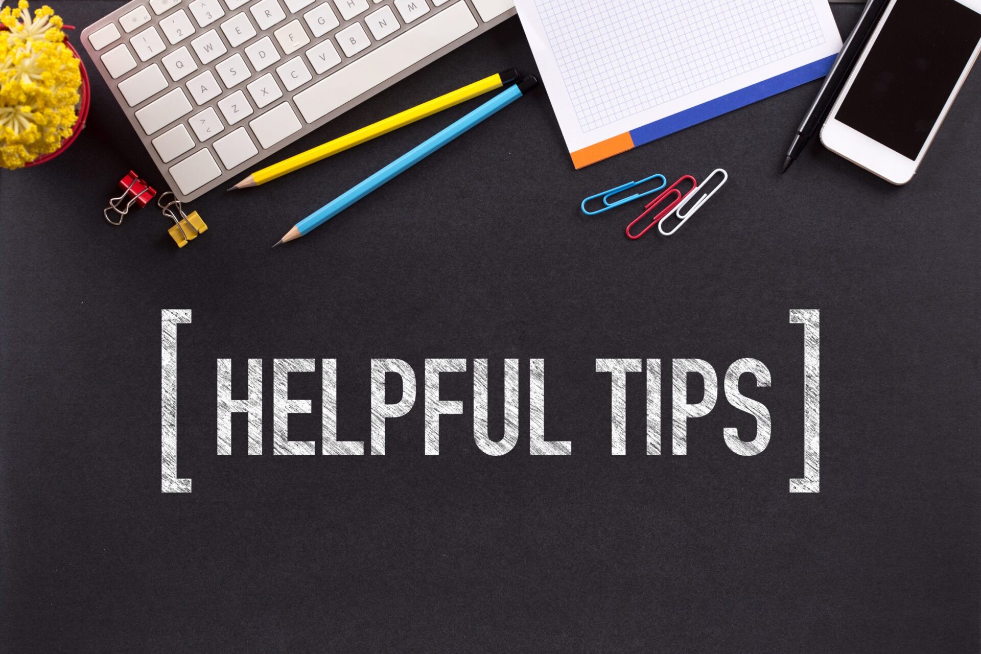 Photo saying [helpful tips] with items of stationary surrounding it
