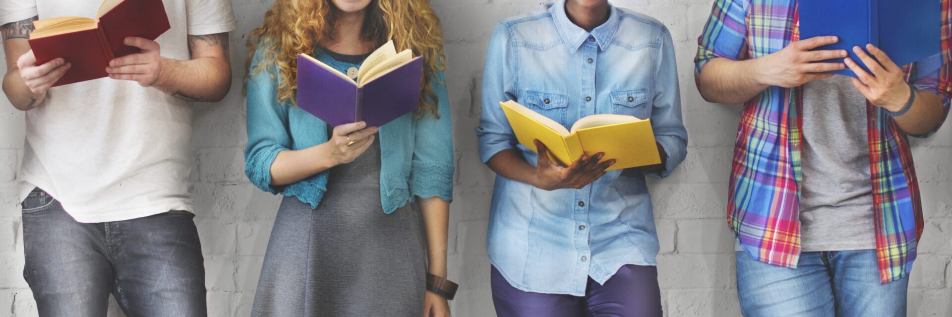 Photo of people reading books