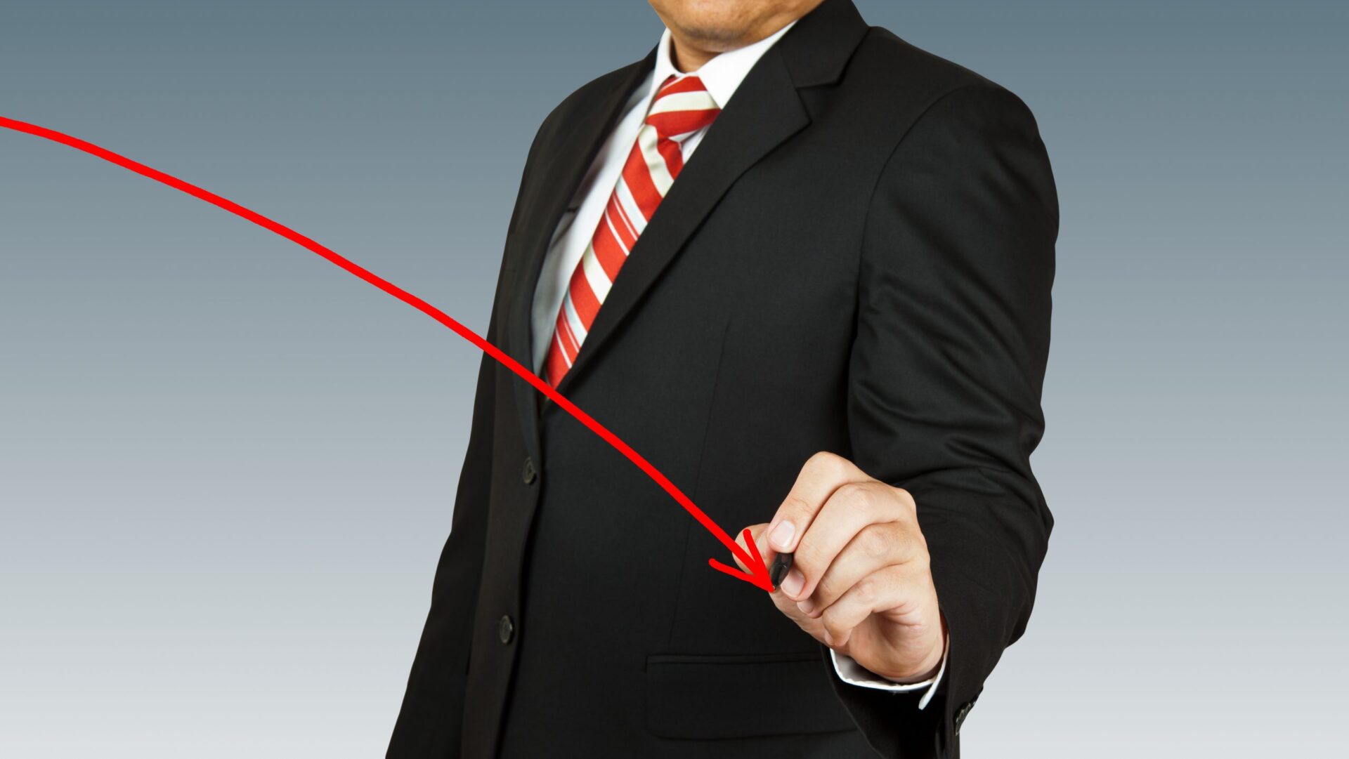 Photo of a man drawing an arrow on the screenpointing downwards