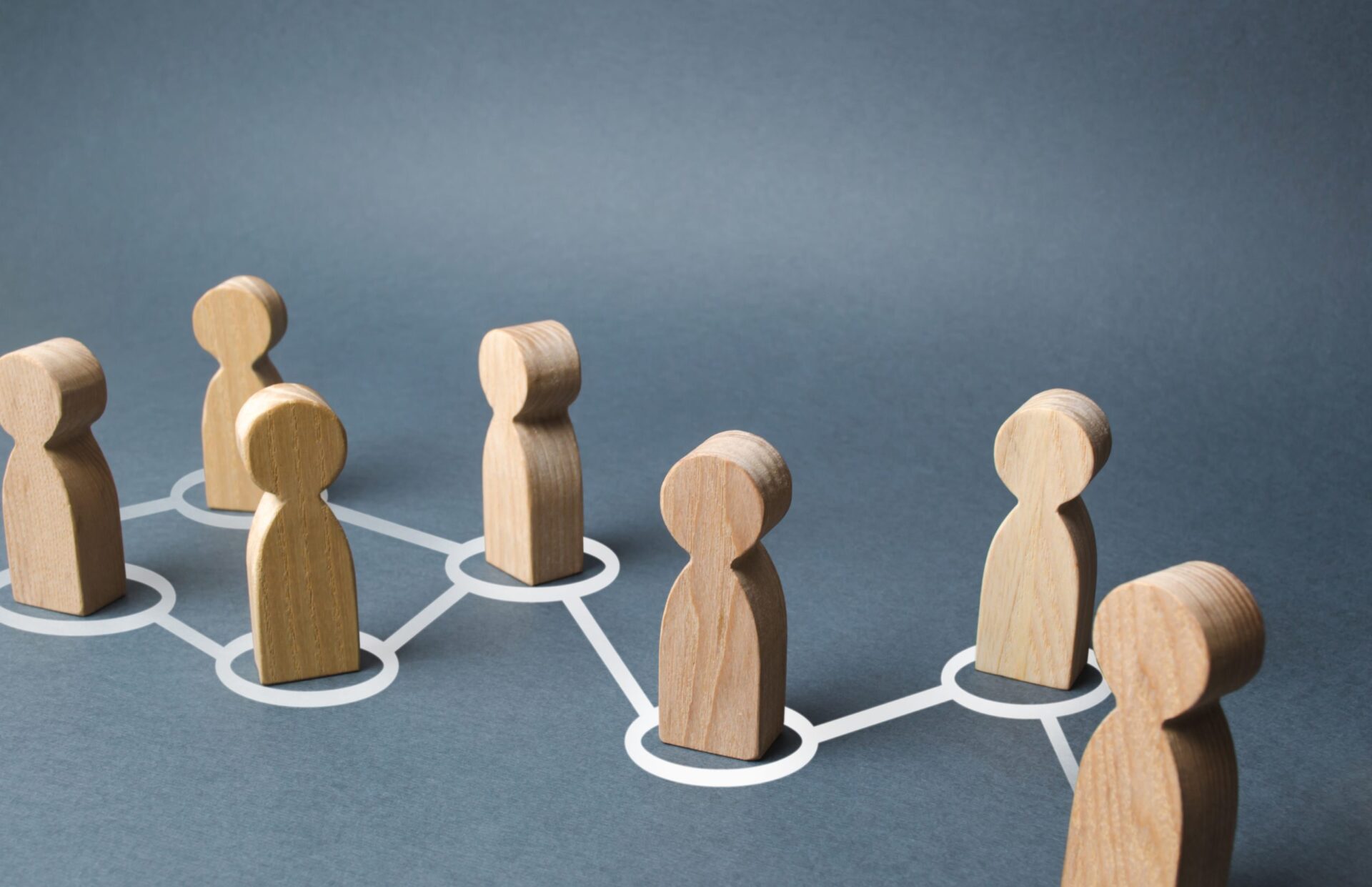 Photo of wooden figures connecting