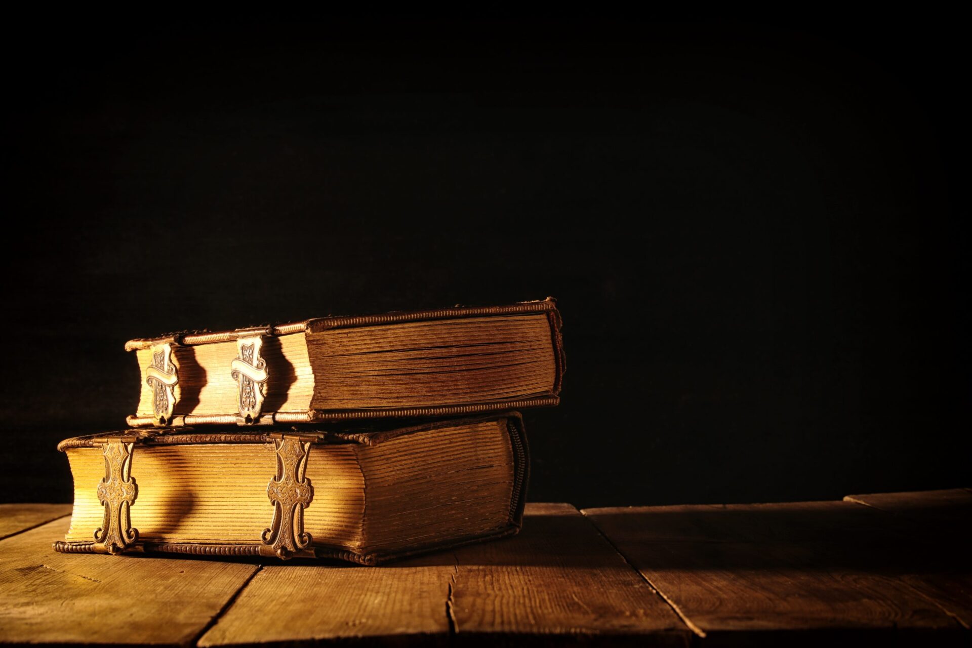 Photo of two books stacked on one another