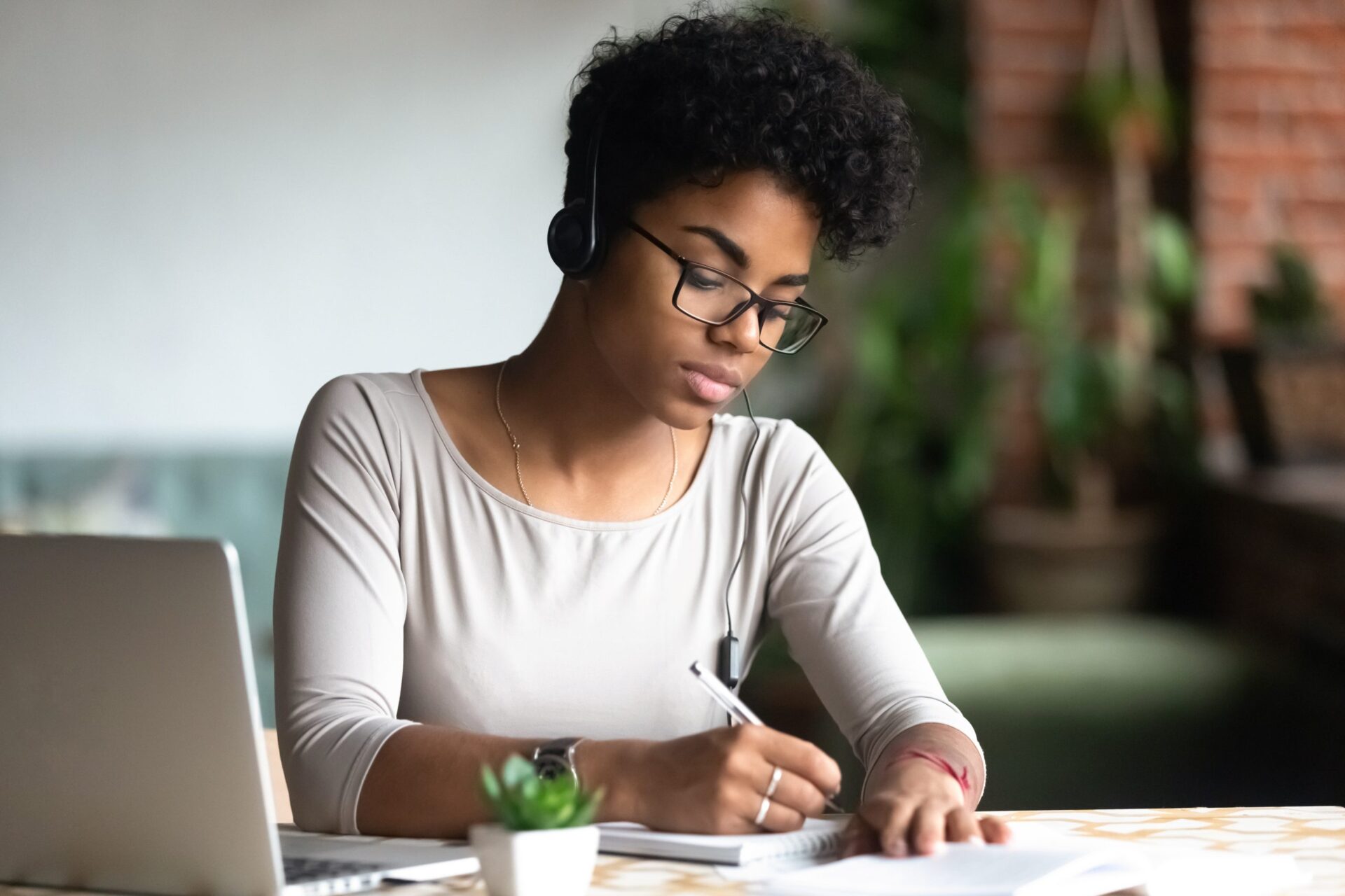 Photo of a women working at her desk